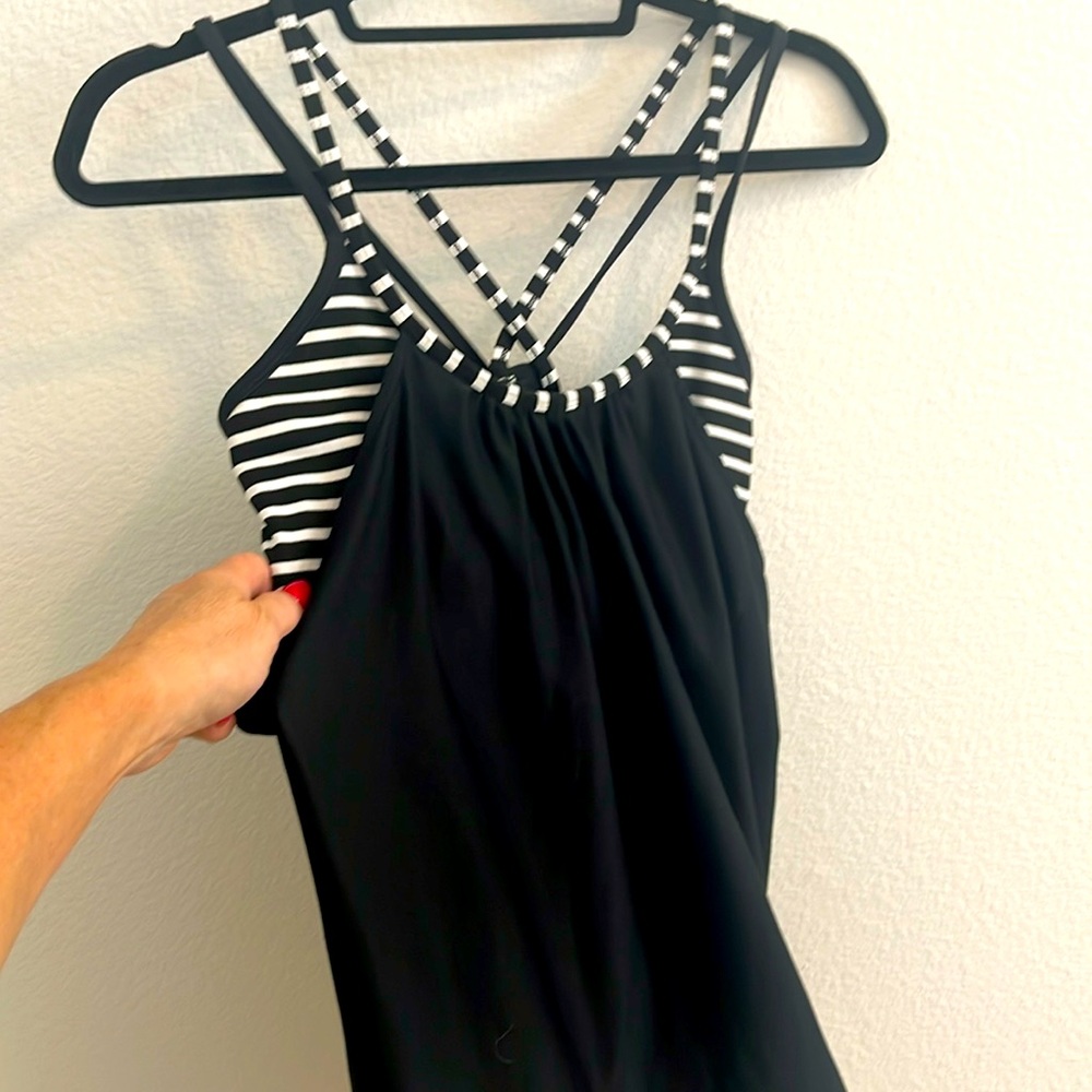 Sports top with attached sports bra